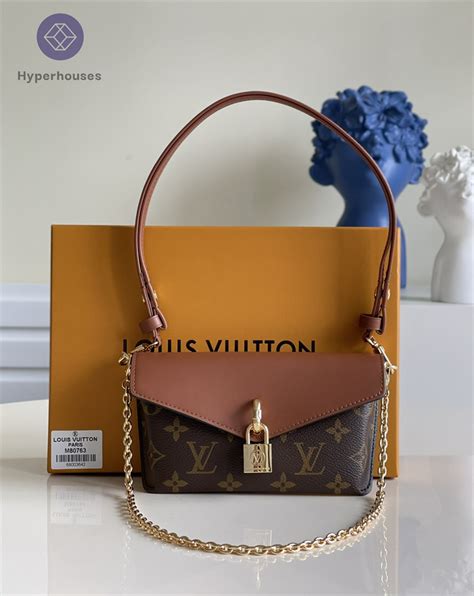 lv locki|lv padlock on strap bag.